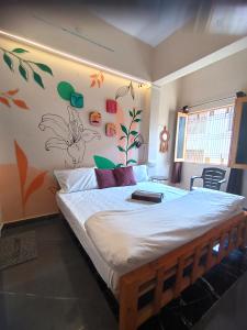 Postel nebo postele na pokoji v ubytování Sukoon River Homestay