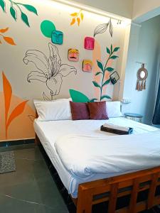 Postel nebo postele na pokoji v ubytování Sukoon River Homestay