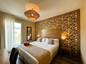 Postel nebo postele na pokoji v ubytování Hotel Windsor Tossa - Adults Only 16 + 32 fotografií