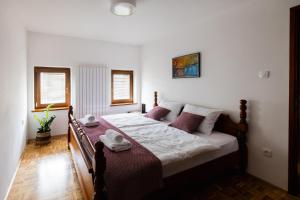 Ένα ή περισσότερα κρεβάτια σε δωμάτιο στο Wellba Holiday Home Otlica