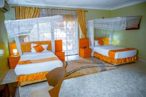 Ένα ή περισσότερα κρεβάτια σε δωμάτιο στο Crystal Suites & Apartments +45 φωτογραφίες