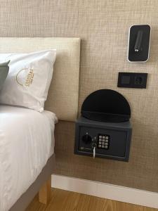 Posteľ alebo postele v izbe v ubytovaní Chinitas Urban Rooms