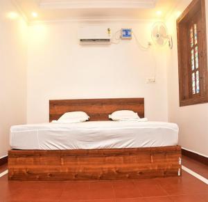 Postel nebo postele na pokoji v ubytování Kps Resort