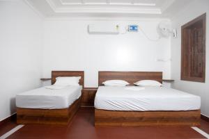 Postel nebo postele na pokoji v ubytování Kps Resort