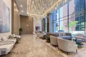 منطقة جلوس في Stylish 1BR in Peninsula Five Views & Pool