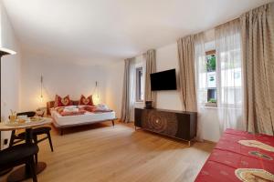 TV a/nebo společenská místnost v ubytování Boutique Hotel Santer Klause