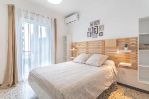 Ένα ή περισσότερα κρεβάτια σε δωμάτιο στο Chambres D'hotes Au Bougainvillier