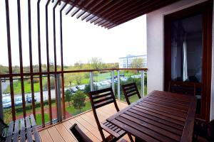Balkón alebo terasa v ubytovaní APARTAMENT z 3 SYPIALNIAMI PRZY PLAŻY