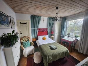 Postel nebo postele na pokoji v ubytování B&B Lilla Lotten