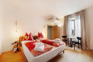 Postel nebo postele na pokoji v ubytování Boutique Hotel Santer Klause