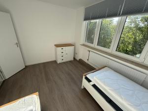 Ein Bett oder Betten in einem Zimmer der Unterkunft Christel Zwischenahn