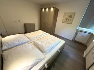 Ein Bett oder Betten in einem Zimmer der Unterkunft Christel Zwischenahn