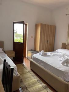 Postel nebo postele na pokoji v ubytování Prela's Rooms + 14 fotografií