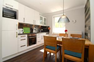 Kuchyň nebo kuchyňský kout v ubytování MEERzeit Ferienwohnung in Rerik + 16 fotografií