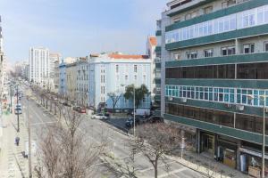 a view of a city street with buildings at Casa da Avenida Lisboa in Lisbon