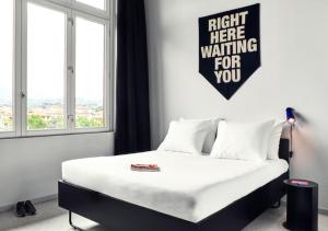 Postel nebo postele na pokoji v ubytování The Social Hub Florence Lavagnini Extended Stay + 28 fotografií