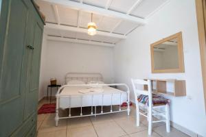 Postel nebo postele na pokoji v ubytování Eleon Luxury Villa