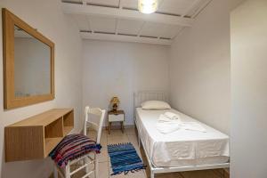 Postel nebo postele na pokoji v ubytování Eleon Luxury Villa