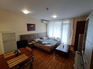 Postel nebo postele na pokoji v ubytování Europroperties Iglika Apartments + 37 fotografií