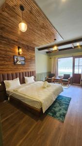 Giường trong phòng chung tại Norden Cottage - The Alpinist