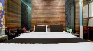 Katil atau katil-katil dalam bilik di Palette Hotel & Resort Barra Formerly SRS