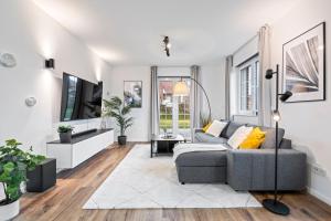 Ruang duduk di Ferienwohnung Strandnest Rosenhagen bei Travemünde