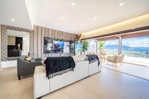 Posedenie v ubytovaní 103 - Luxurious 3 Bed Duplex Penthouse With Stunning Mountain Views