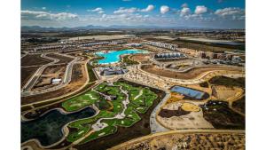 an aerial view of a resort with a pool at Villa Almendro Santa Rosalia Lake and Life Resort by PREMIUM SPAIN PROPERTIES in Torre-Pacheco