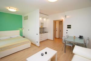 Postel nebo postele na pokoji v ubytování Hotel Roma + 37 fotografií