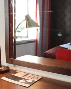 Postel nebo postele na pokoji v ubytování Art Hostel Honkahovi