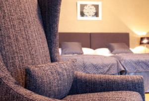 Postel nebo postele na pokoji v ubytování Art Hostel Honkahovi