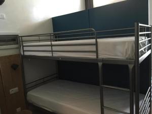 Letto o letti in una camera di Midi 81 HOSTEL