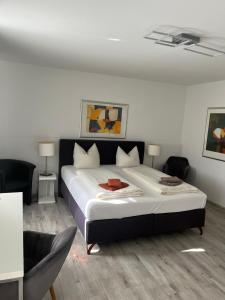 Postel nebo postele na pokoji v ubytování Hotel Link