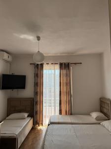Voodi või voodid majutusasutuse GuestHouse Cami toas