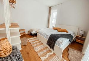A bed or beds in a room at Villa Erdődy Resort