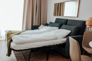 A bed or beds in a room at Villa Erdődy Resort