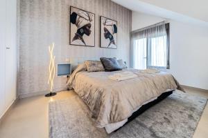 Posteľ alebo postele v izbe v ubytovaní 103 - Luxurious 3 Bed Duplex Penthouse With Stunning Mountain Views