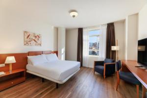 Posteľ alebo postele v izbe v ubytovaní Sercotel Arrahona Sabadell