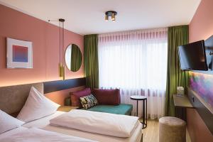 Postel nebo postele na pokoji v ubytování Westend Hotel (non-smoking) + 33 fotografií