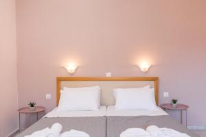 Postel nebo postele na pokoji v ubytování Garden Budget Rooms + 35 fotografií