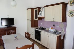 Η κουζίνα ή μικρή κουζίνα στο Cuore di Legno Country House