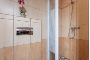 Łazienka w obiekcie Lucsony Apartman