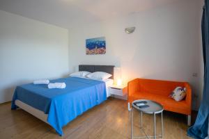 Łóżko lub łóżka w pokoju w obiekcie Apartments Gaja blue ap