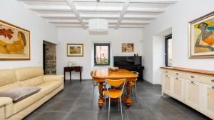 a living room with a couch and a table at Casale Paolina by Rentbeat in Ceccano