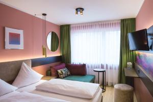Postel nebo postele na pokoji v ubytování Westend Hotel (non-smoking)