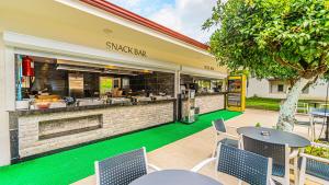 A restaurant or other place to eat at Viking Garden Hotel