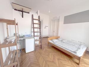 Posteľ alebo postele v izbe v ubytovaní Artist Guest House + 37 fotografií