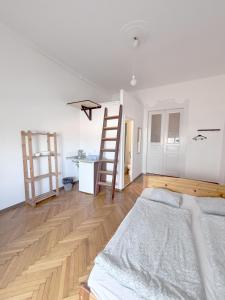 Posteľ alebo postele v izbe v ubytovaní Artist Guest House