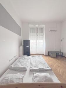 Posteľ alebo postele v izbe v ubytovaní Artist Guest House