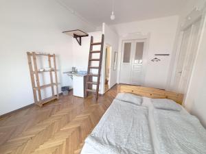 Posteľ alebo postele v izbe v ubytovaní Artist Guest House